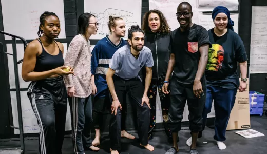 A group of young theatre trainees posing for photo